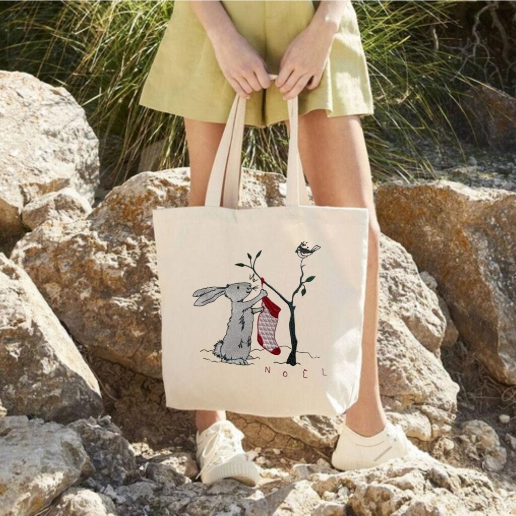 bunny with christmas stocking tote bag